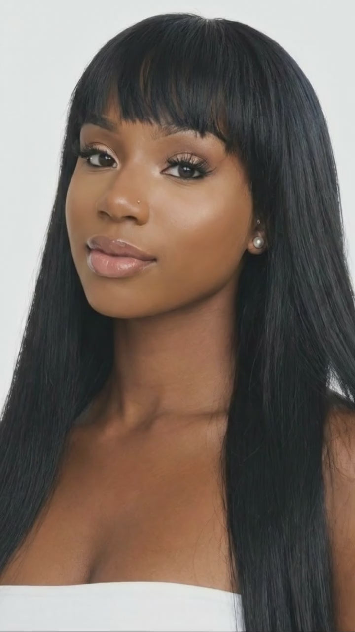 A video demonstration showing the natural wearing effect of a long straight human hair wig with a black fringe for women